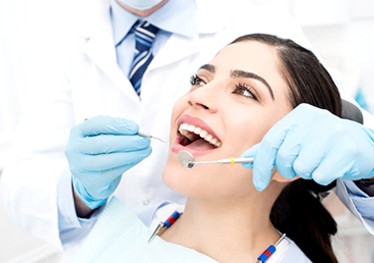 woman getting dental checkup in Garland