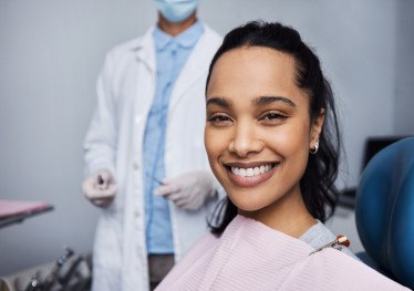 Patient in Garland at dentist needing a tooth extraction